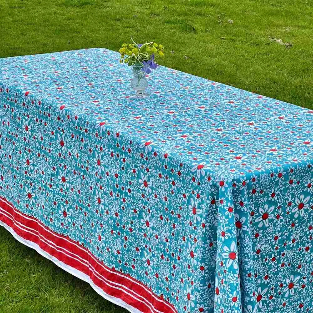 Turquoise daisies rectangular tablecloth with a red striped border