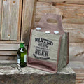 Wanted Wife Must Love Beer canvas beer caddy with bottles on a wooden bench