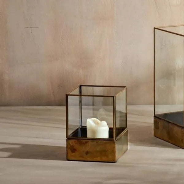 Small and large Sampara storm lanterns side by side