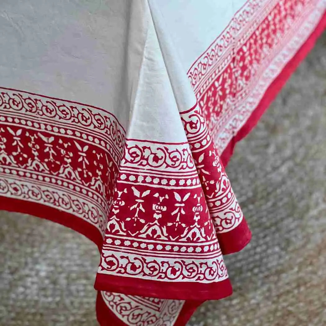 Corner of the Ruby Garland tablecloth showing the red garland border