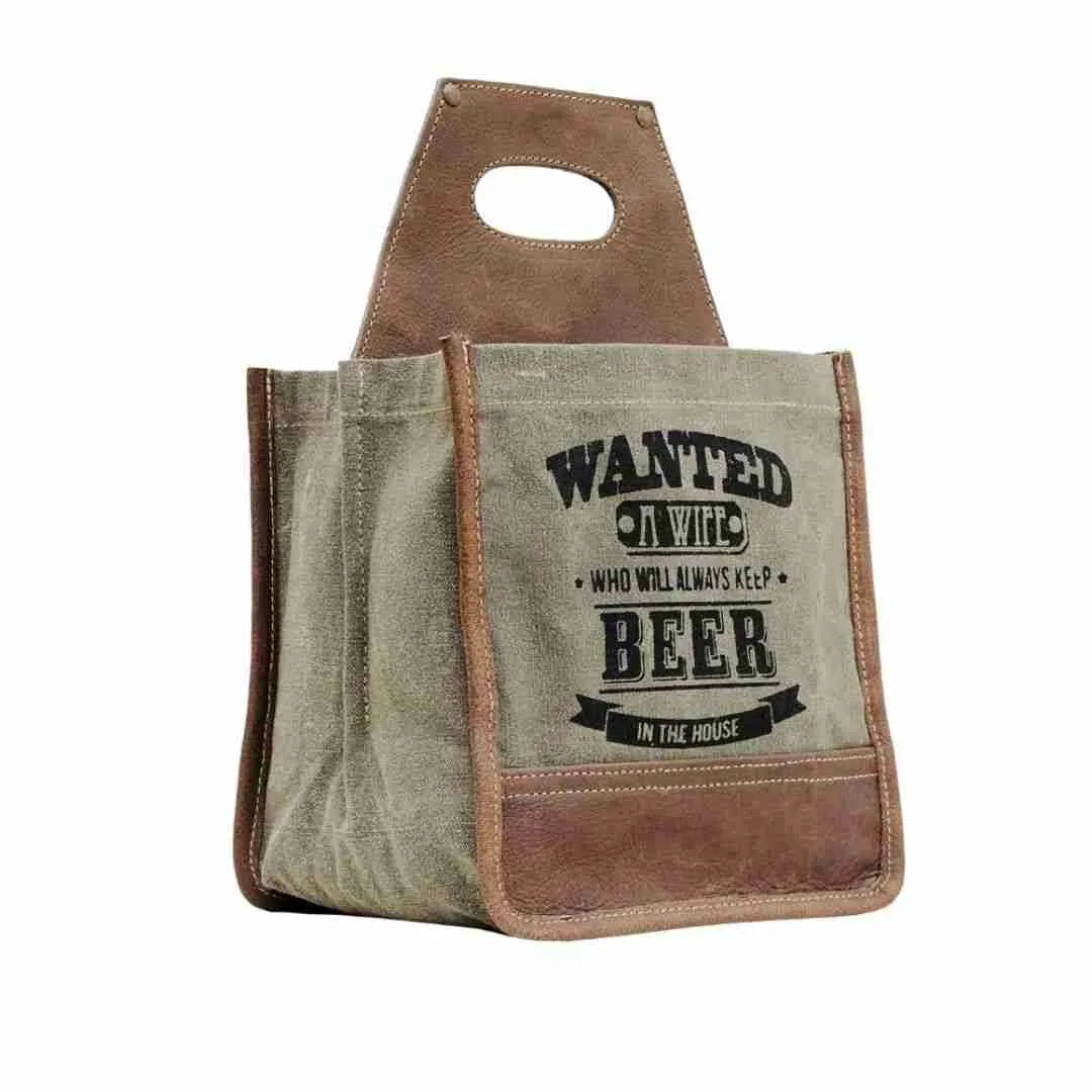 Wanted Wife canvas beer caddy with a leather handle, side view