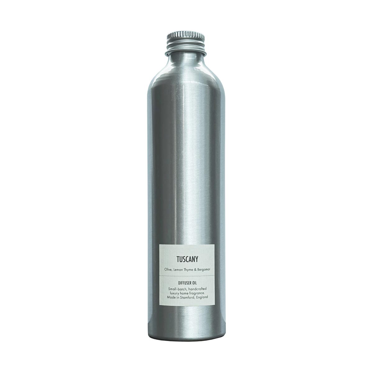 Silver bottle of The Wick and Wax Co diffuser oil refill