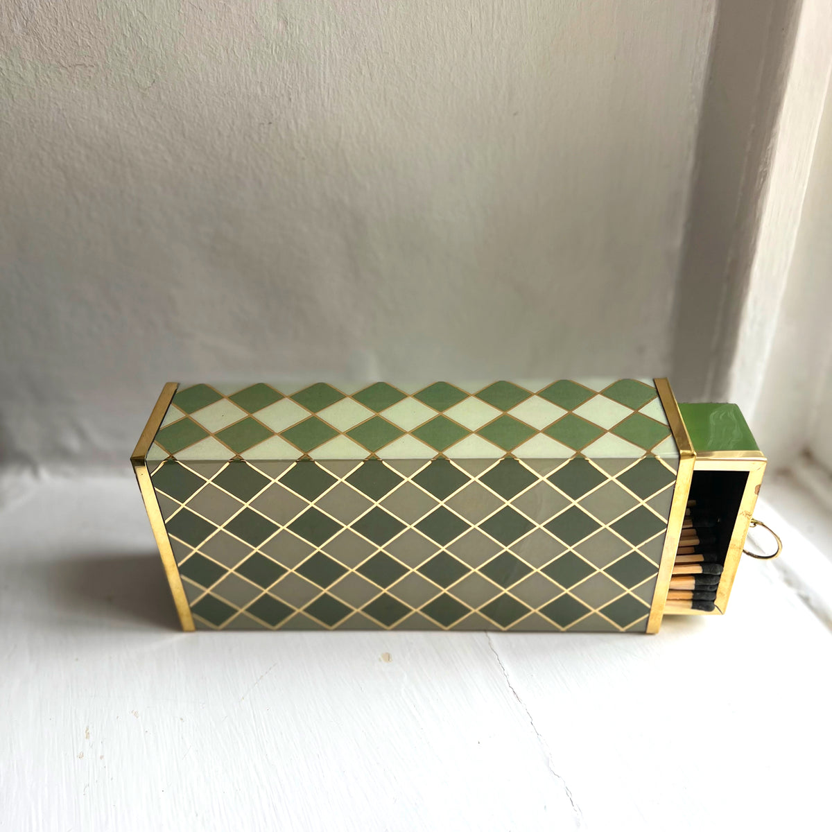 Harlequin oversized matchbox in Sage Green, angled view