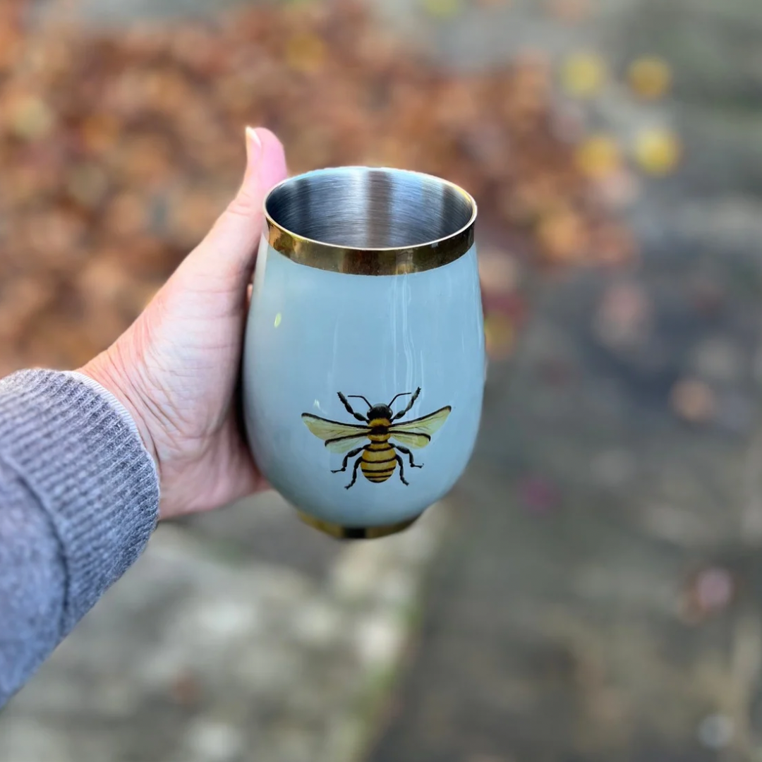 Sage green insulated wine tumbler with a Honeybee design