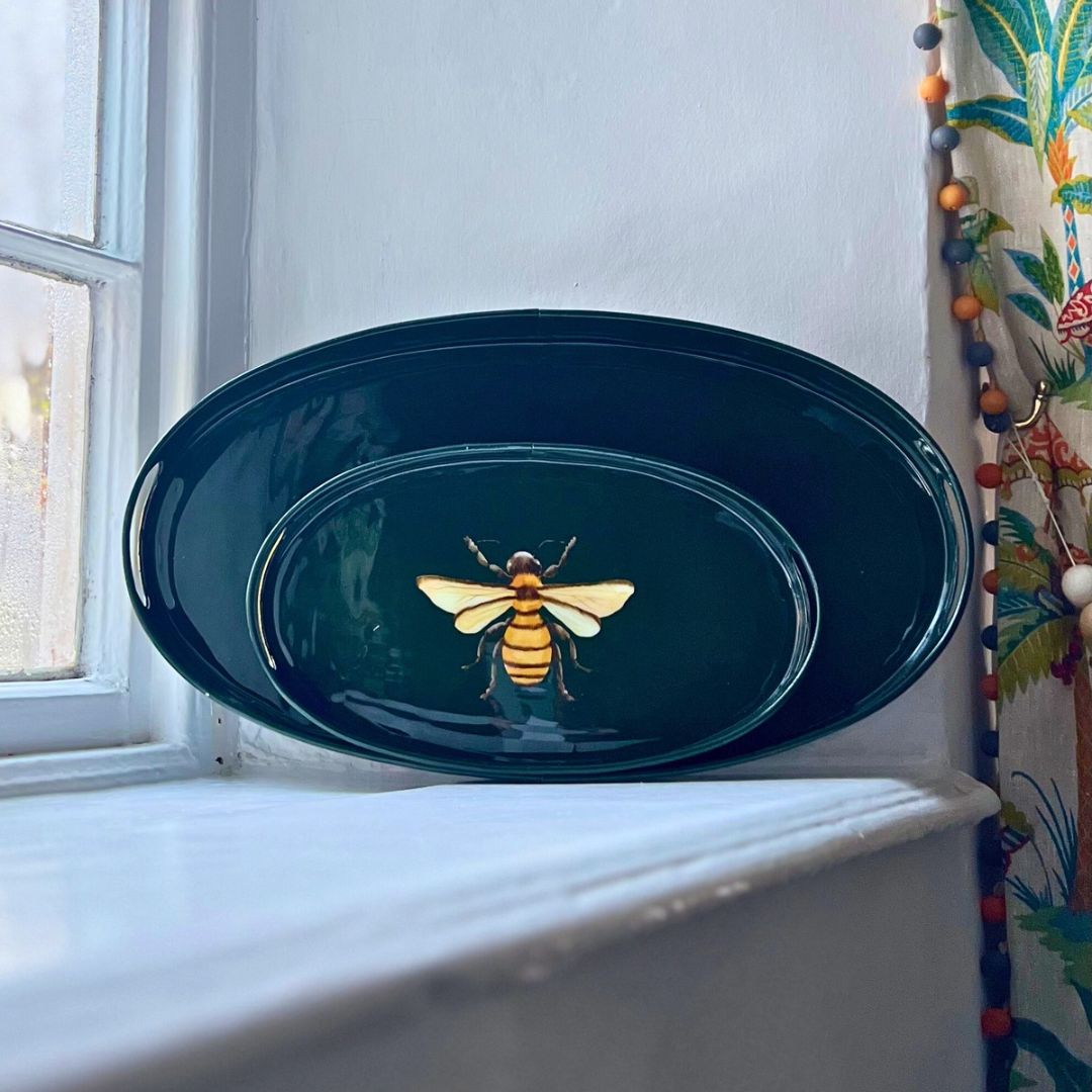 Honeybee small oval tray in dark green enamel and brass, front view