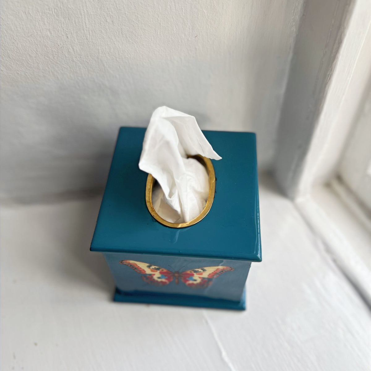 Butterfly square tissue box in teal enamel and brass, side view