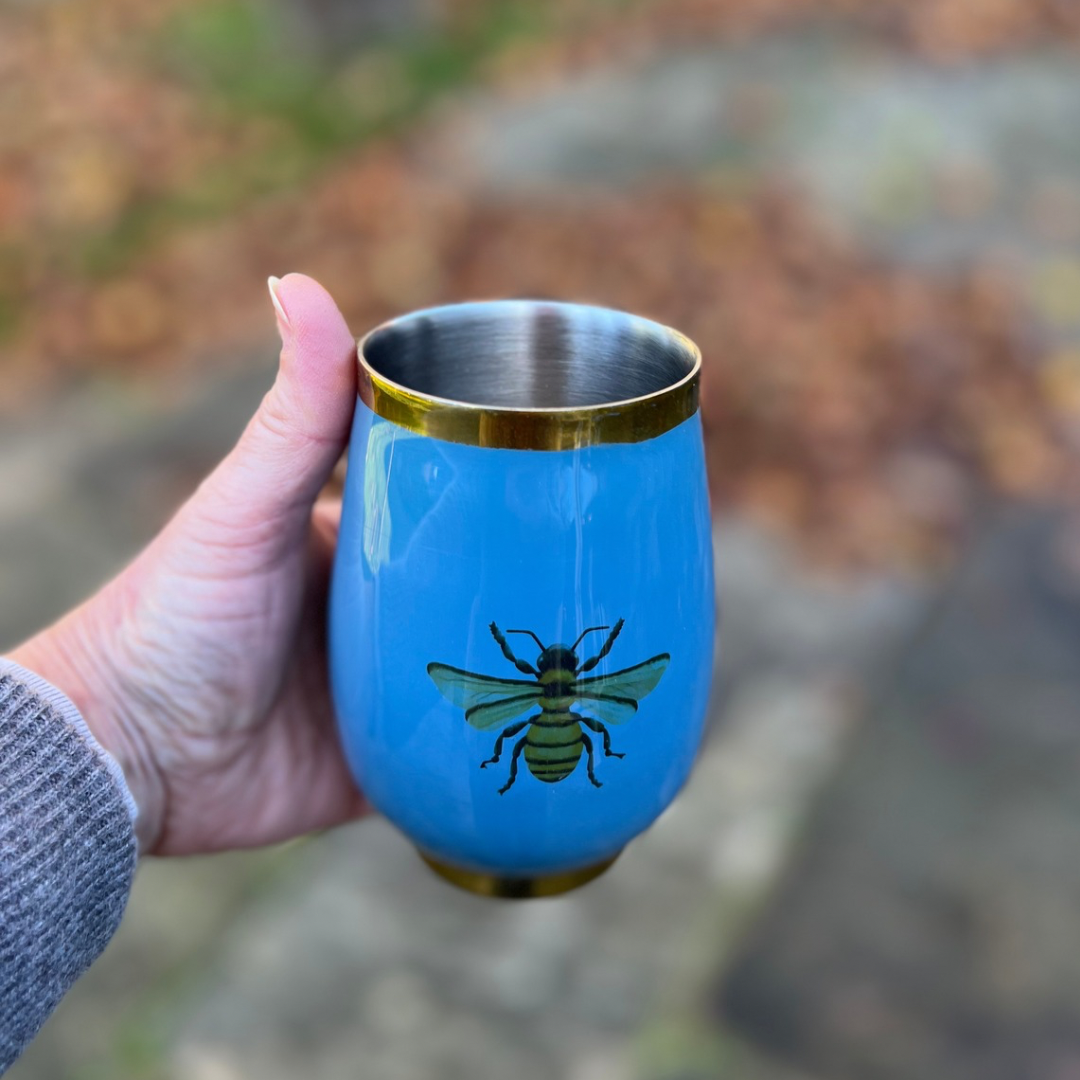 Blue insulated wine tumbler with a Honeybee design