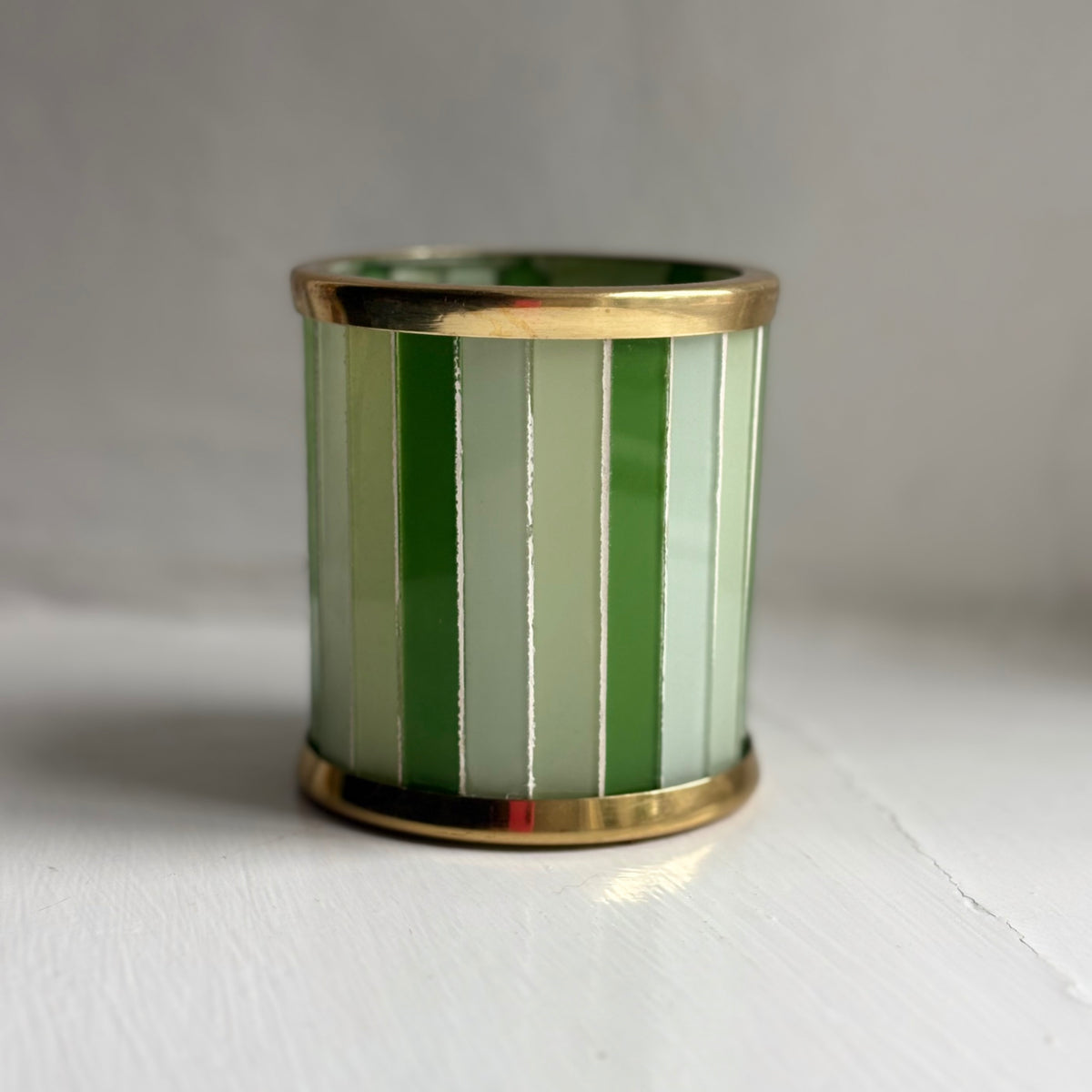 Garden Mint green striped glass tealight holder with a brass rim