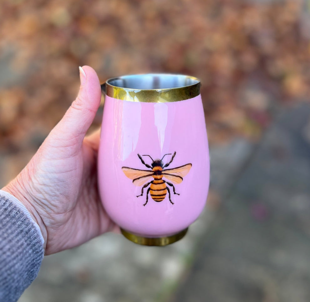 Pink insulated wine tumbler with a Honeybee design