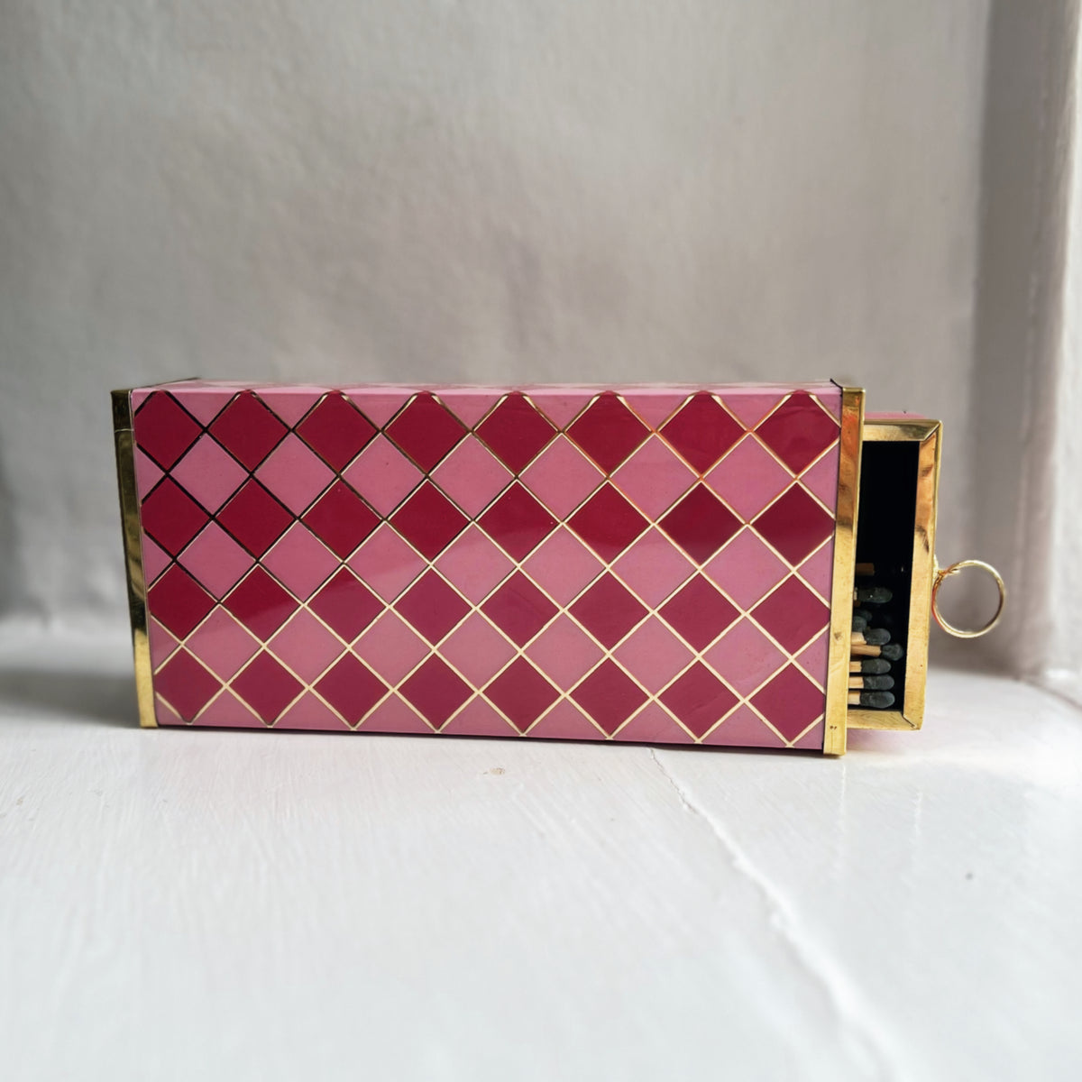 Harlequin oversized matchbox in Raspberry Pink, front view