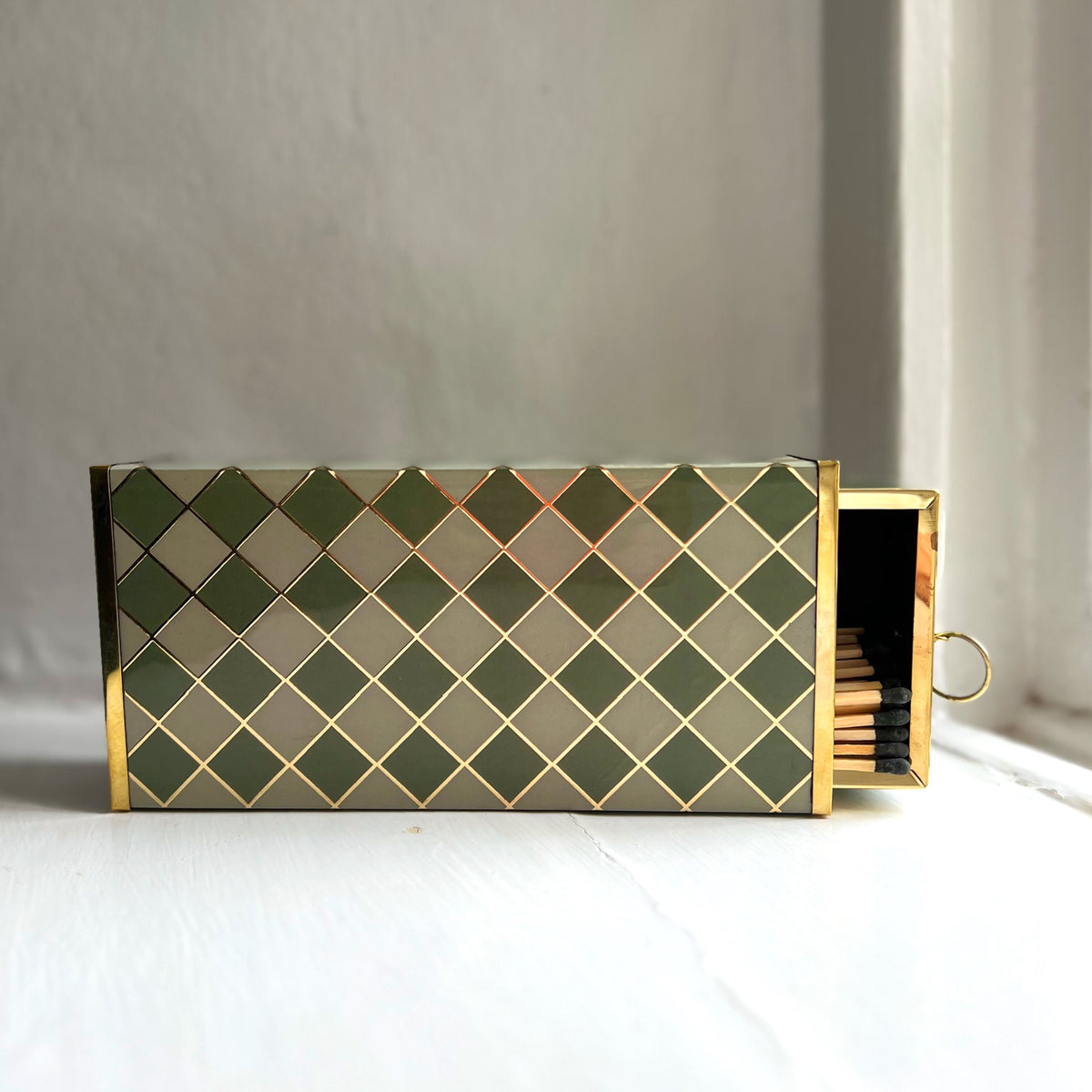 Harlequin oversized matchbox in Sage Green, front view
